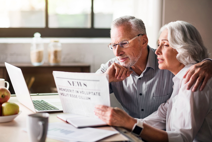 Couple researching about investment loans